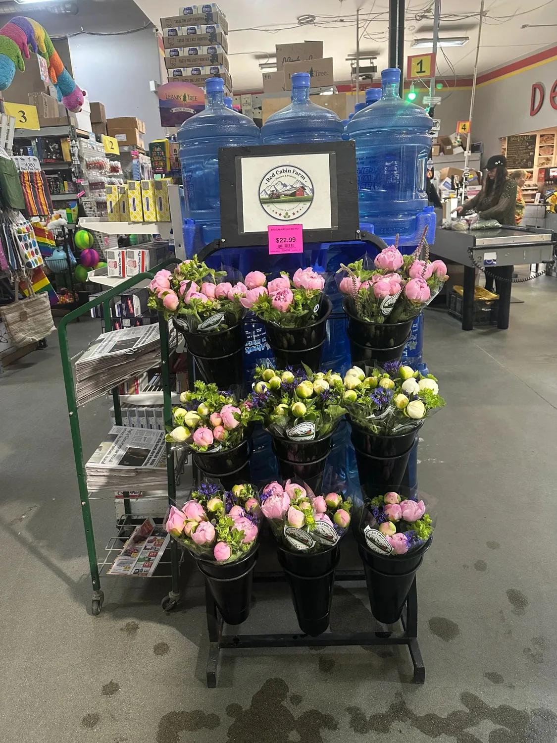 Peony bouquets displayed at a Homer retail location